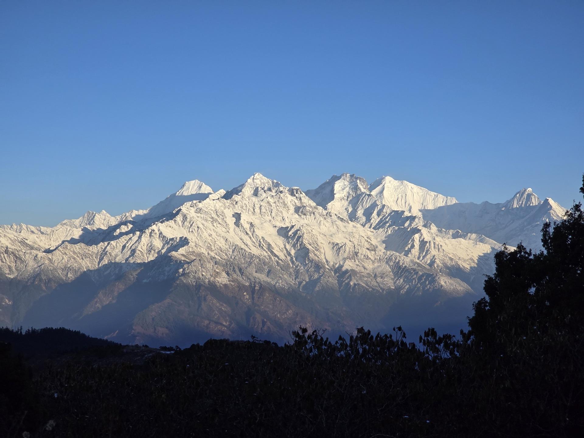 The Ganesh Himal range catching gold sunrise light