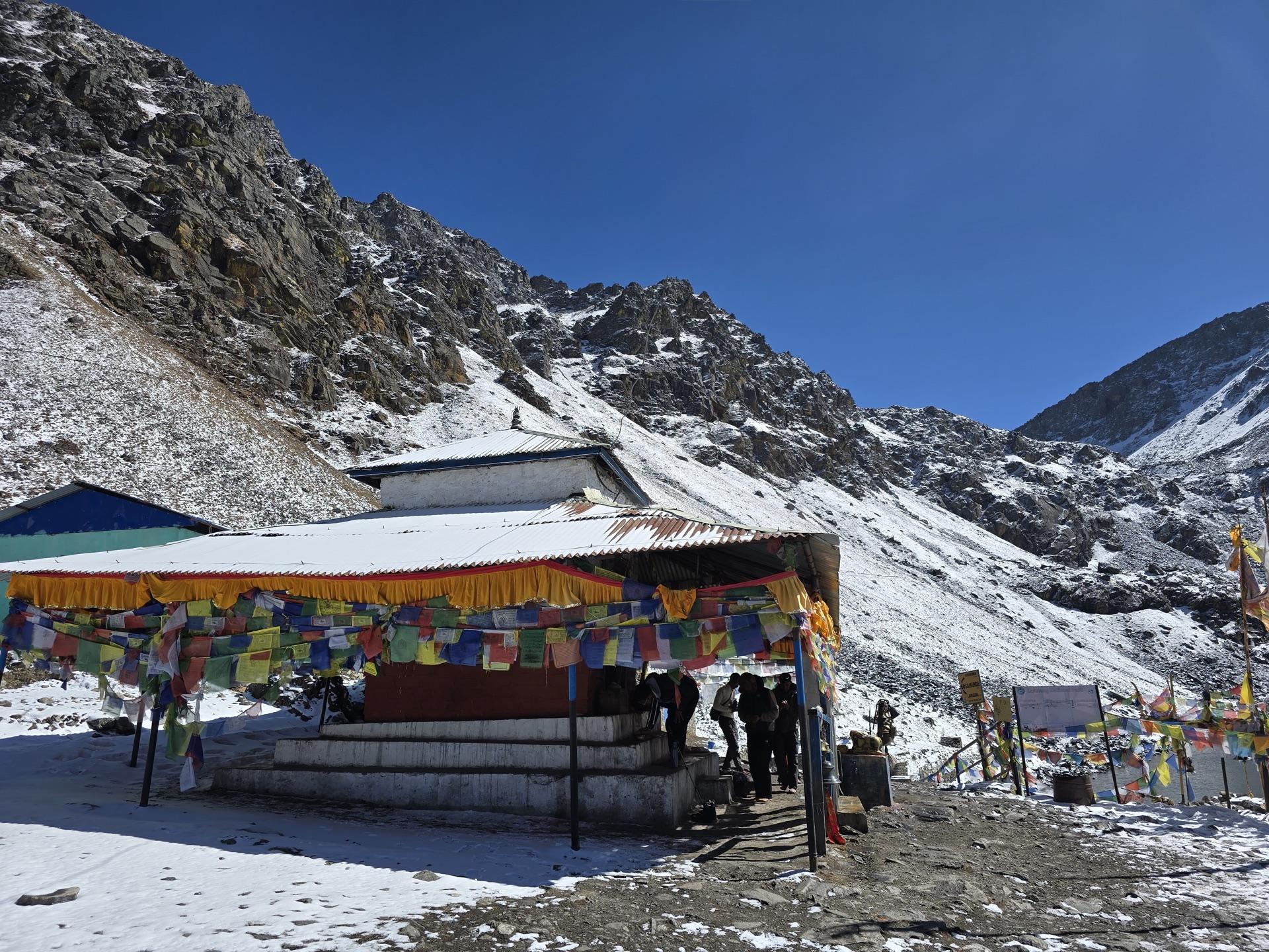 The prayer-flag-strung teahouse at Gosaikunda in the snow