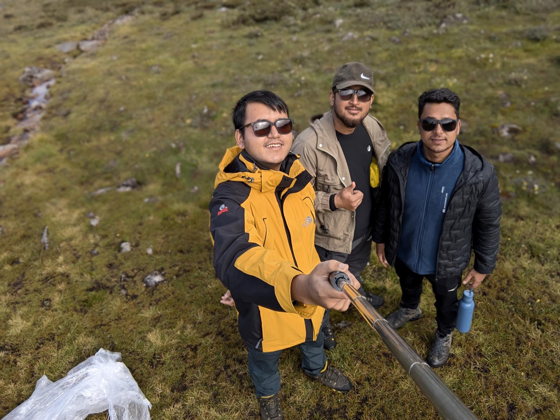 Three of the group in a sunny selfie at the basin meadow
